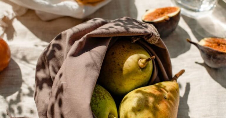 Eco-Friendly Countertops - Bags with Fresh Fruits and a Glass of Water Standing in Sunlight