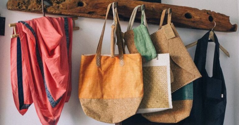 Reclaimed Wood - Reusable Shopping Bags Hanging on a Hanger Made of Salvaged Wood