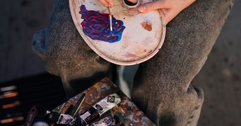 Mixing Colors - A Painter Mixing Paint on Palette using a Paintbrush