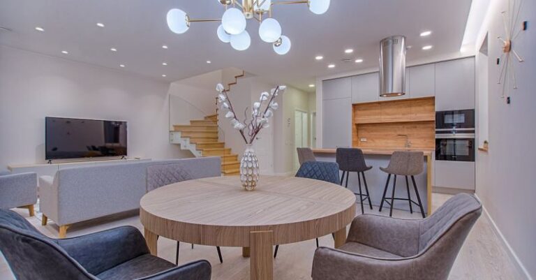 Kitchen Lighting - Round Brown Wooden Table With Chairs Inside Room