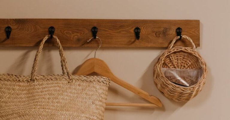 Natural Materials - Brown Woven Tote Bag Hanged on Beige Wall